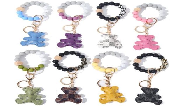 

8 styles silicone bead bracelet keychain party wooded beads keyring old flower plaid bear decoration key ring pu leather ornament 1757785, Blue