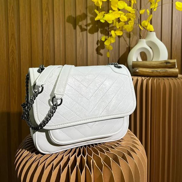 

women's luxury crossbody bag the latest edition of imported crepe oil wax cowhide magnetic four-button size 22*16.5*12cm one-shoulder o