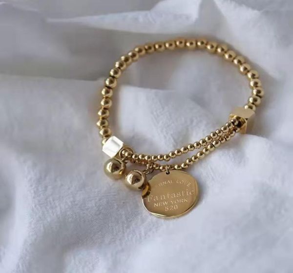 

stainless steel ball beads bracelet for women circle tag charm stretch strand bracelet quotfantastic eternal love new york2786026, Golden;silver