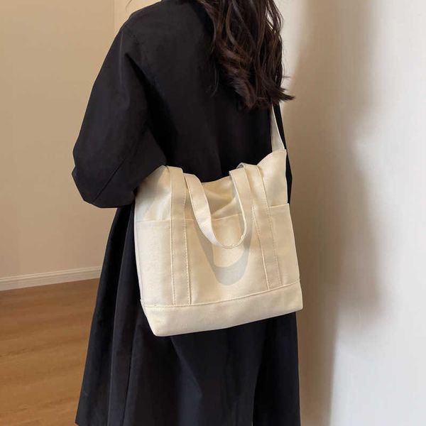 

large capacity commuting tote bag simple and versatile one shoulder bag ins student school outfit book canvas bag female