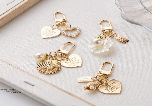 

new arrival shell key chain cute heart shell key ring for gift party diy jewelry accessories whole 6744455, Slivery;golden