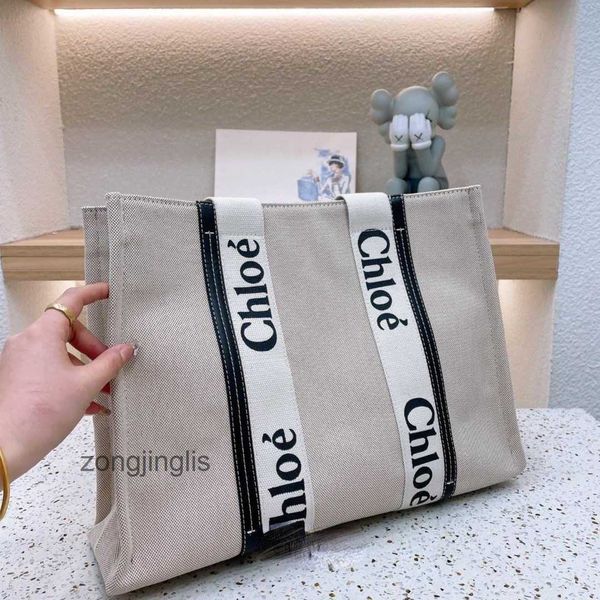

bags hands designer outlet woody tote 2023 bag cloe handbag fashion beach one shoulder canvas niche design portable large tote women's