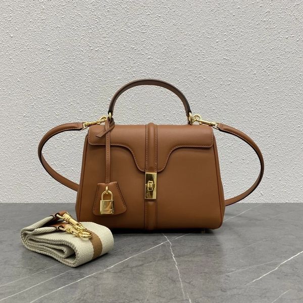

designer handbag women's shoulder bag can be tilted back and tote, flip switch cut edge clamshell flat bag design, detachable leather s
