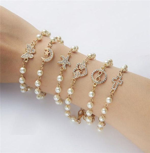 

dhl korean fashion star starfish cross butterfly angel wings charm imitation pearl bracelet for women jewelry summer beach style6706488, Golden;silver