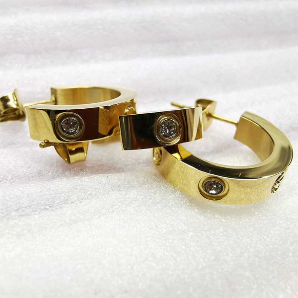 

selling funds classic carti titanium steel screws stone c-shaped earrings donkey exaggerated, Golden;silver