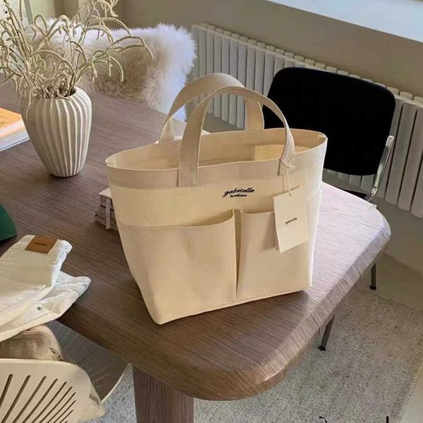 

dongdamen niche design gabrielle canvas bag multi pocket handbag ins simple tote women's bag