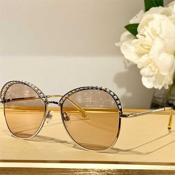 

2023 new quality xiaoxiangfeng edge pearl metal ch4246 sunglasses for women light color high beauty glasses can be paired with myopia, White;black