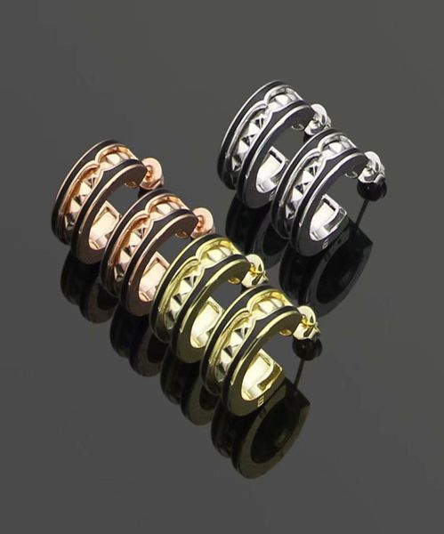 

europe america style lady women titanium steel engraved b initials spiral black ceramic cshape stud earrings 3575679432200, Golden;silver