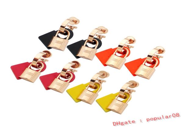 

europe america simple style lady women titanium steel tassels engraved h initials rubber and metal lock stud earrings 3 color4208099, Golden;silver