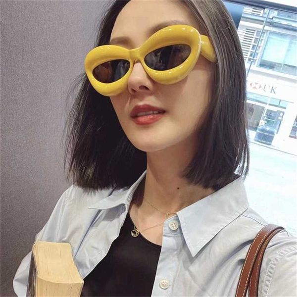 

2023 new cat's eye sunglasses for women ins the same type of personalized pout lips sunglasses lw40097i, White;black