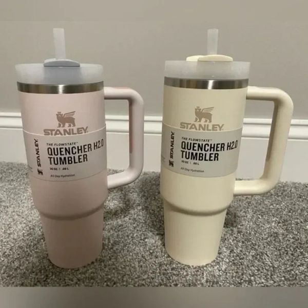 

rose quartz stanley with logo quencher h2.0 40oz tumblers cups handle insulated car mugs frosted lids straws stainless steel coffee termos r