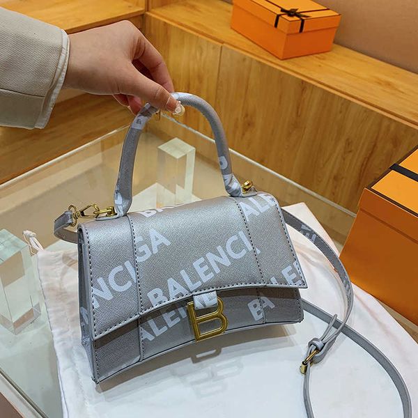 

shop-designed bags are sold y 2023 new fashion versatile letter handbag with high appearance and red temperament cross shoulder
