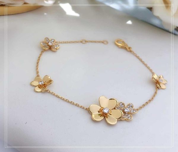 

s925 sterling silver plated 18karat gold threeflower ladies bracelet the golden flower gift8460485, Golden;silver