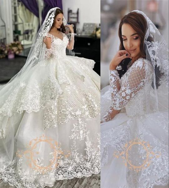 

2021 arabic gorgeous ball gown wedding dresses princess with long sleeves v neck ruffle layers chapel train bridal dress vestidos 5813085, White