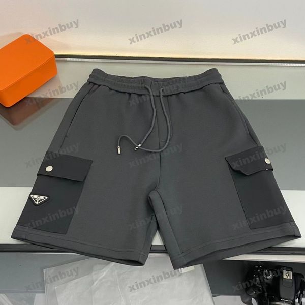 

xinxinbuy men women designer shorts pant nylon pocket metal triangle label spring summer brown white black gray s-xl