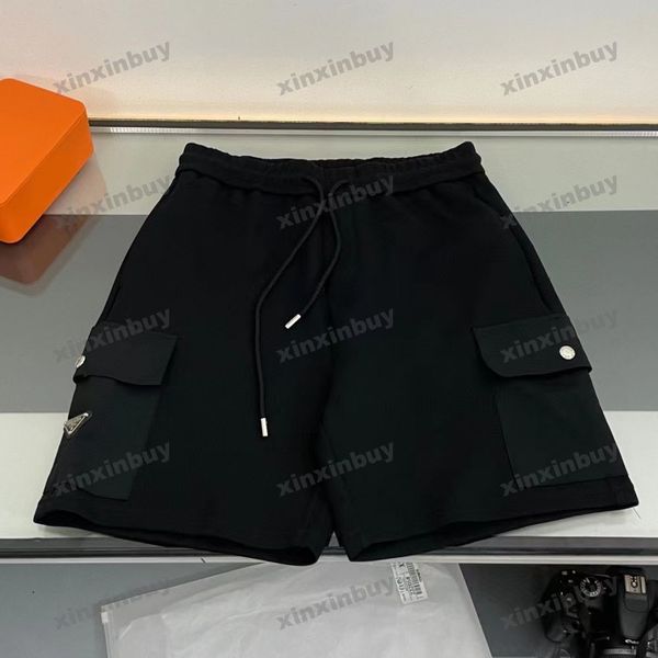 

xinxinbuy men women designer shorts pant nylon pocket metal triangle label spring summer brown white black gray s-2xl