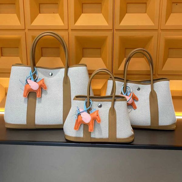 

garden party bags designer genuine leather premium canvas bag 2023 new contrast color women's commuter casual one shoulder handbag tote
