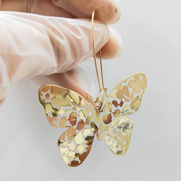 

exaggerated butterfly earrings, brass material, irregularly shaped hollow butterfly earrings, Golden;silver