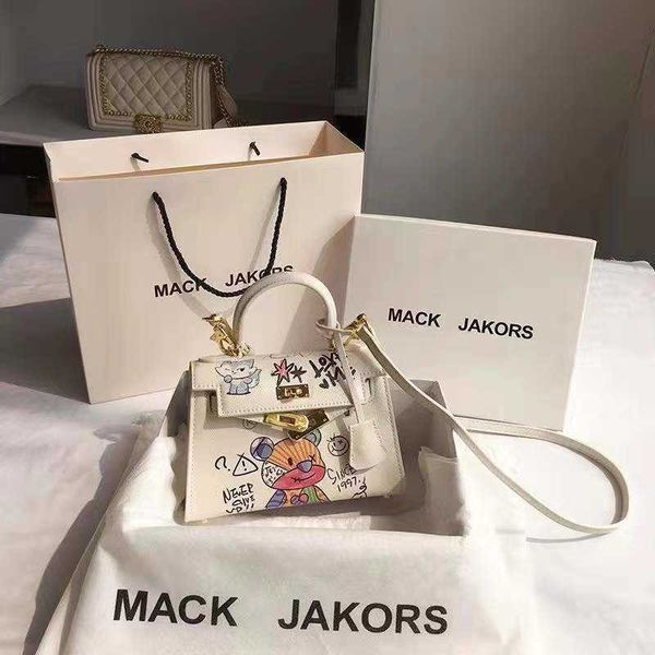

designer hemrres tote bag hong kong mackjakors leather autumn and winter bear graffiti kelys bag women 2023 new fashion messenger