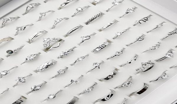

whole 100pcs sparkling silver rings fashion simple women039s wedding band rings mixed style gift party engagement jewelry2240175