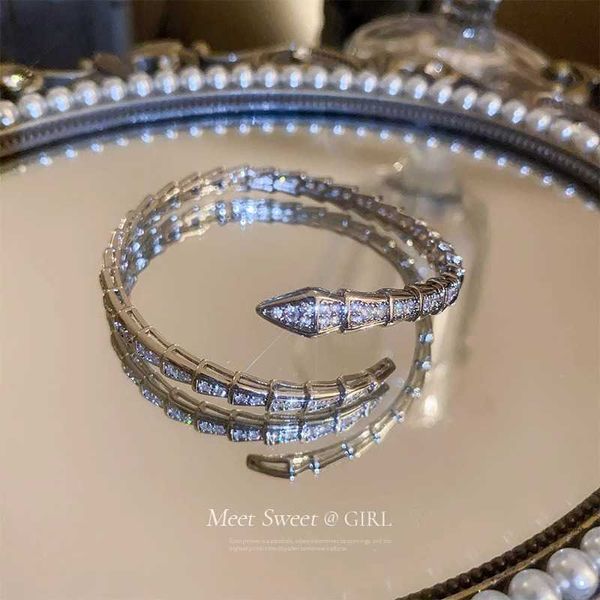 

sweet cool zircon shaped with female minority design silver snake bone opening fashion bracelet, Golden;silver
