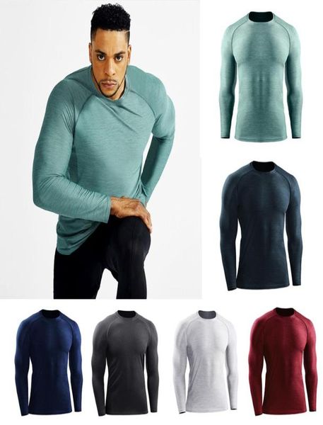 

2021 mens t-shirt yoga europe us running fitness clothing quick-drying tee sportswear long-sleeved compression training stretch slim tights