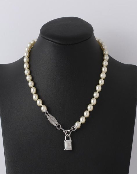 

trendy jewelry saturn pearl with enamel tridimensional lock necklace for women3927774, Silver