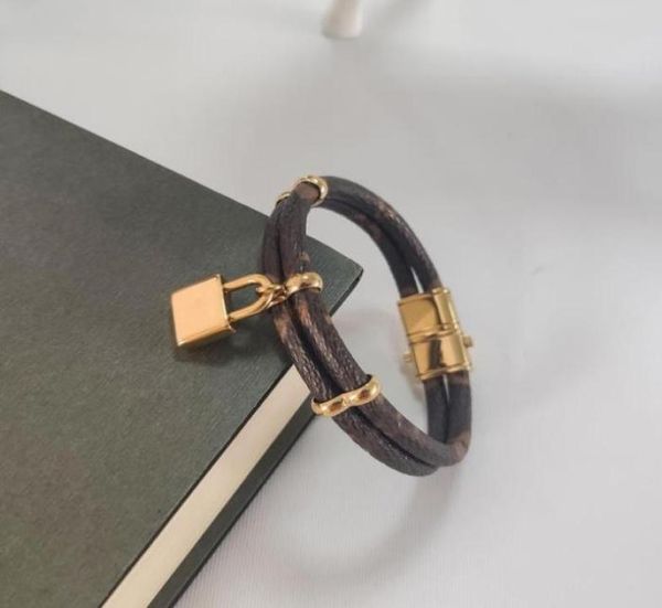 

luxury jewelry feminine leather designer bracelet with gold heart brand logo on a high end elegant fashion bracelet with a four ea5842643, Golden;silver