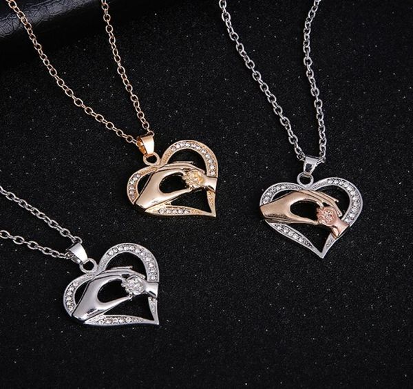 

whole gold silver fashion hand pendant necklace with crystals family love heart pendant necklaces women quality jewlry8994189