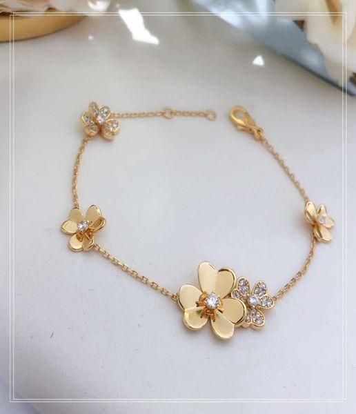 

s925 sterling silver plated 18karat gold threeflower ladies bracelet the golden flower gift5625512, Golden;silver