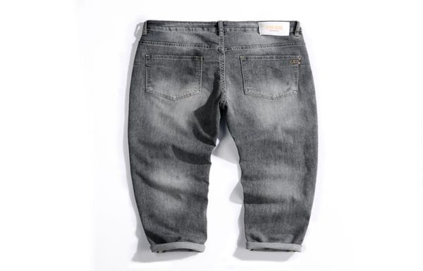 

rose embroidery jeans fashion blue black ripped male tide slim pants7539862