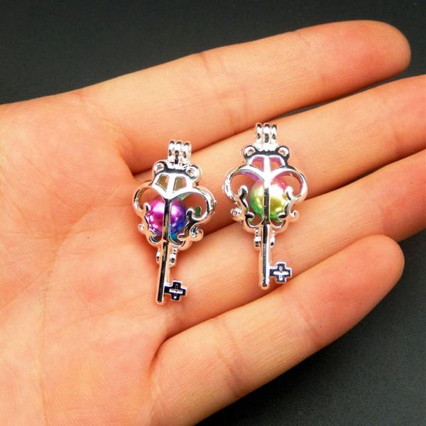 

in 2018 the new bright silver key pearl cage 10pcs jewelry making pearl cage pendant essence oil diffuses pearl pearl7254125