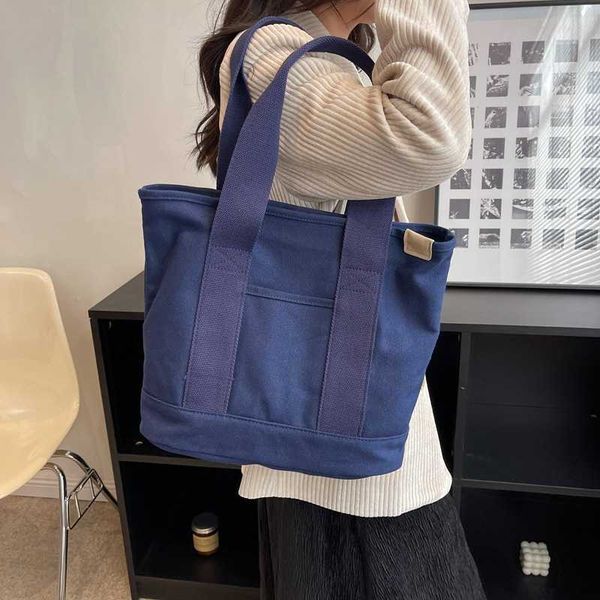 

new simple and large capacity small and versatile canvas portable bag for women tote commuter bento bag tide