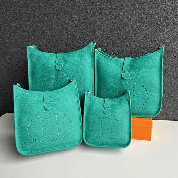 

2023 new hemrres layer cowhide litchi pattern men's and women's universal hollow cross body bag evelynn genuine leather