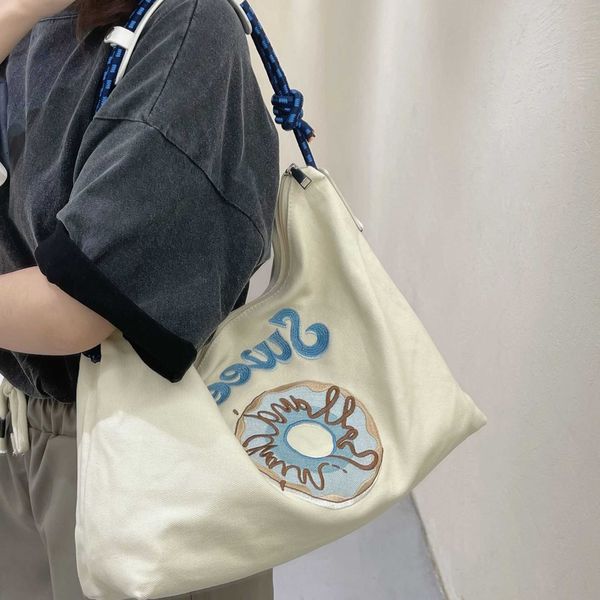 

small design embroidered canvas bag large capacity tote bag embroidered one shoulder underarm bag