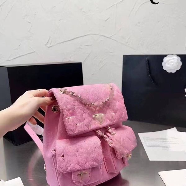 

2023 new fashion casual ladies small fragrant wind ring chain backpack ladies cowhide travel bag small schoolbag handbag