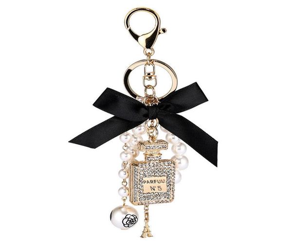 

2021 new imitation pearl perfume bottle keychain car ring holder bag charm pendant accessories bow key chain fashion keyring1210548, Slivery;golden
