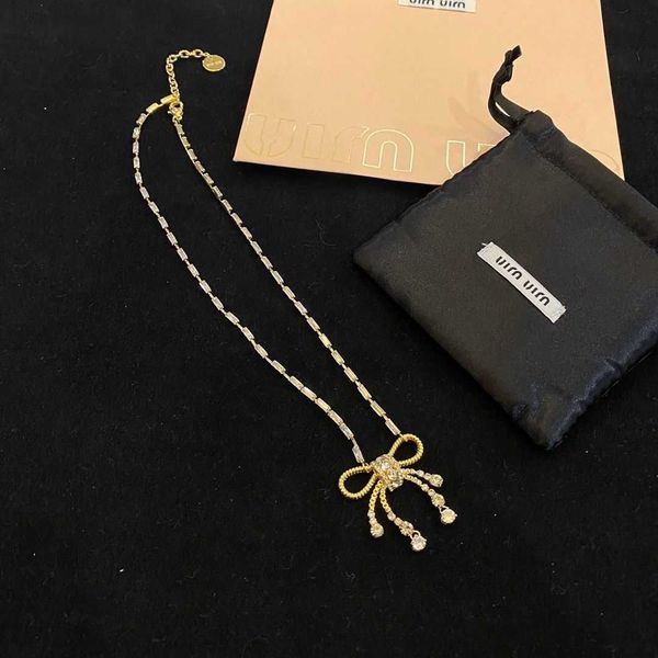 

miss miu's new gold bow necklace is a luxurious french style advanced clavicle chain, Silver