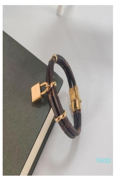 

luxury jewelry feminine leather designer bracelet with gold heart brand logo on a high end elegant fashion bracelet with a four ea9771860, Golden;silver