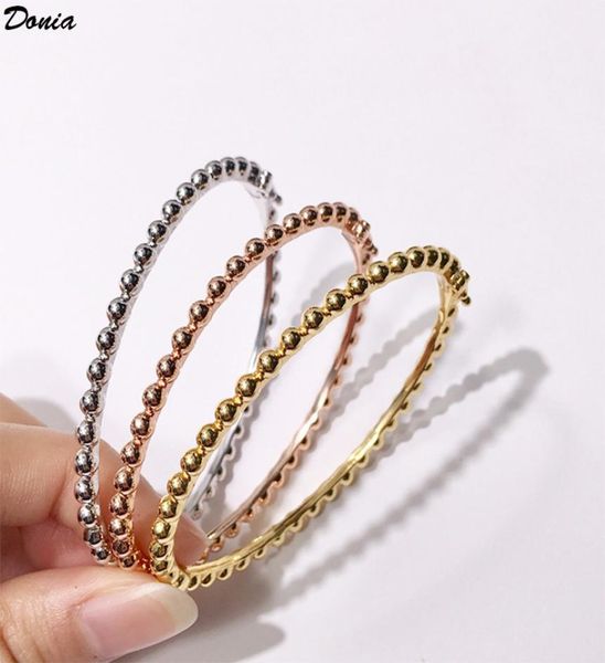 

donia jewelry tri color electroplating exaggerated micro inlay lucky pearl copper bracelet personalized fashion designer bracelet 7678095, Black