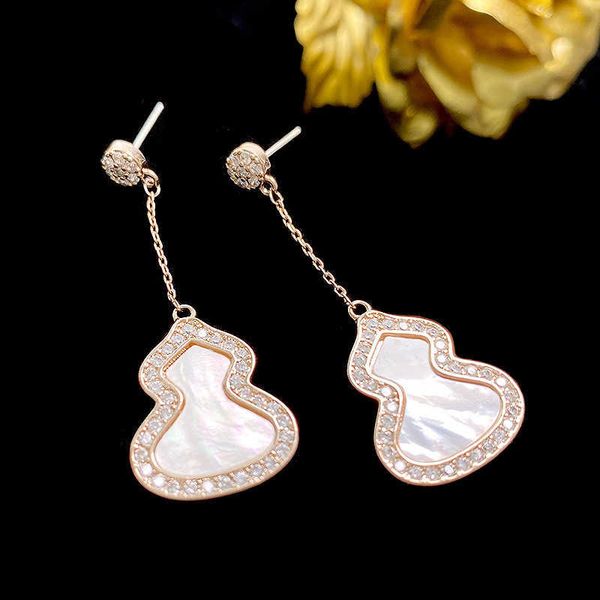 

charm korean version internet celebrity natural shell gourd micro inlaid zircon long earrings feminine and luxurious silver needle earrings, Golden