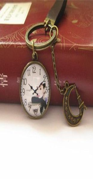 

novelty audrey hepburn keychain cameo clock key chain vintage leather key chain handmade jewelry k0013015183, Slivery;golden