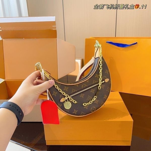 

2023~new fashion brand pea bun moon teeth bun women's bag quality light luxury one shoulder oblique straddle bag