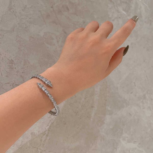 

advanced with bone and snake shape light luxury opening platinum hand decoration simple bracelet small zircon, Golden;silver