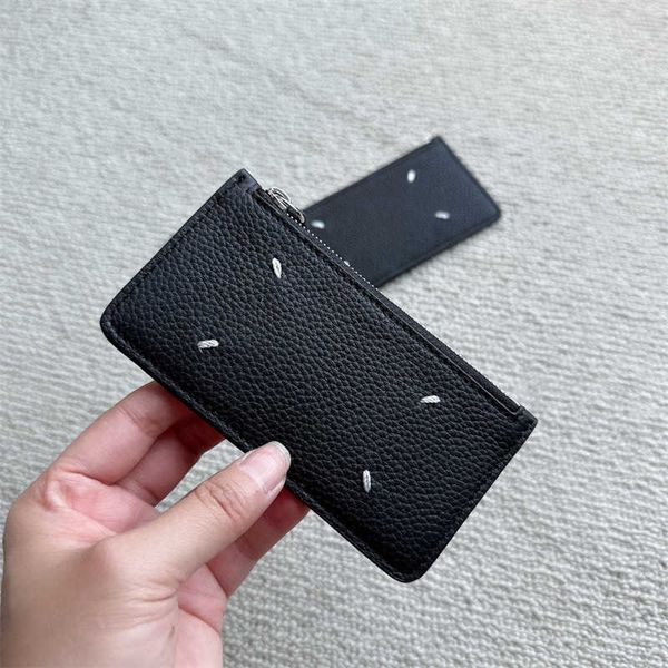 

margiela majira's new layer cowhide pickup bag with long zipper and zero wallet for both men and women
