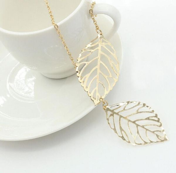 

vintage women silver gold charm chain necklace hollow leaf clavicle necklace two leaves pendant necklace jewelry2771608