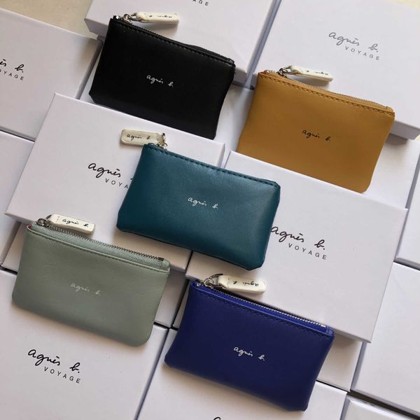 

japan's new fashion brand men's and women's simple hand bag horizontal zero wallet small things storage bag coin bag card bag
