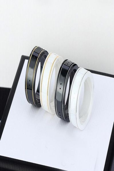 

2022 ceramic band rings black white for women men jewelry gold silver ring8402675