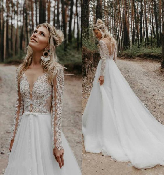 

2020 bohemian wedding dress lace appliqued long sleeve sheer v neck vestido de noiva sweep train beach boho wedding dresses bridal2479609, White