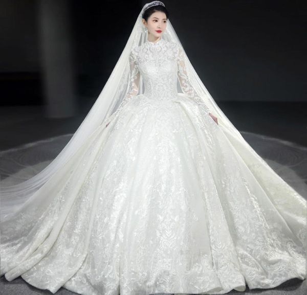 

2023 plus size a line wedding dresses long illusion sleeves lace applique jewel sheer neck beaded pearls custom made chapel weddin1179375, White